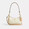 Teri Mini Crossbody Bag in Signature Leather