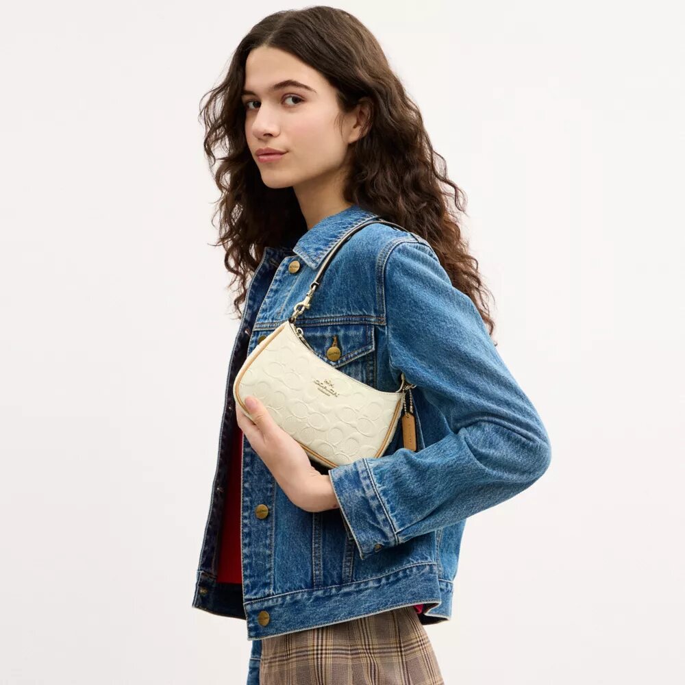 Teri Mini Crossbody Bag in Signature Leather