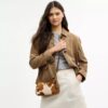 Teri Shoulder Bag in Haircalf with Cow Print