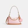 Teri Shoulder Bag in Signature Canvas with Charms