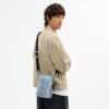 Tristan Crossbody Bag 14 in Loved Signature Denim with Charms